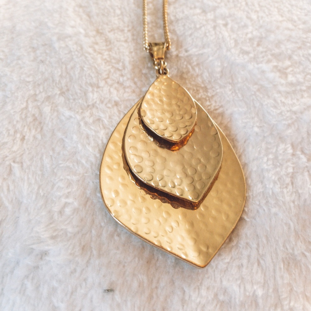 Long gold necklace